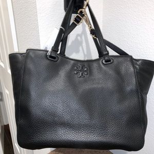 Auth Tory Burch Baby Bag. NWT. Black Pebble Leather. Many compartments.